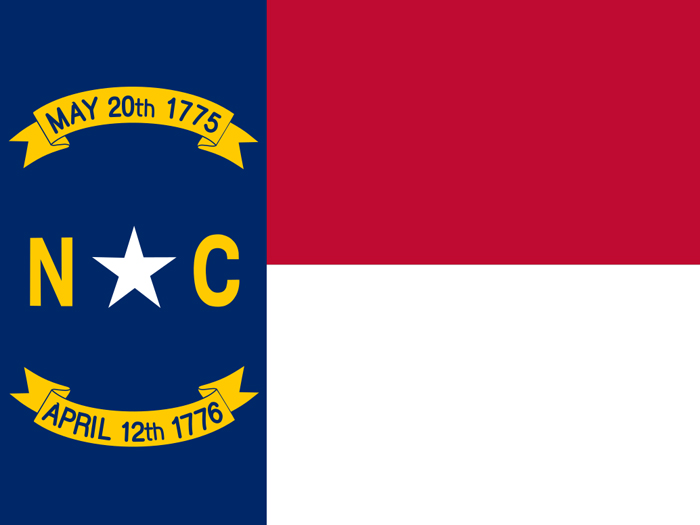 flag-of-north-carolina-with-horizontal-red-stripe-over-white-stripe-and-vertical-blue-stripe-with-state-seal-at-hoist