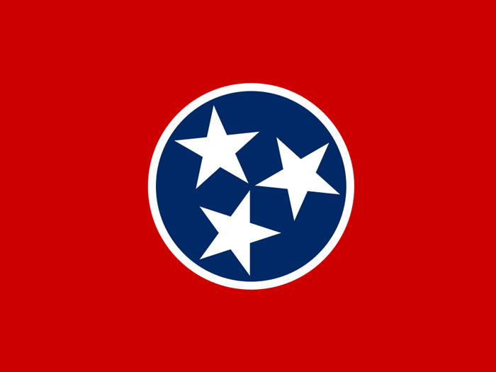 flag-of-tennessee-in-red-field-with-central-blue-disk-with-three-stars-all-in-whites-and-vertical-unequal-white-and-blue-stripe