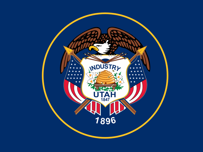 flag-of-utah-in-dark-blue-field-with-the-state-seal-at-the-center
